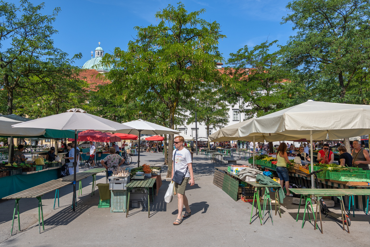 Ljubljana, Slovenia - July 21, 2022 - Central Market in the city, open-air marketplace called Plecnik Covered Market with small food shops, vegetable and fruits stalls.