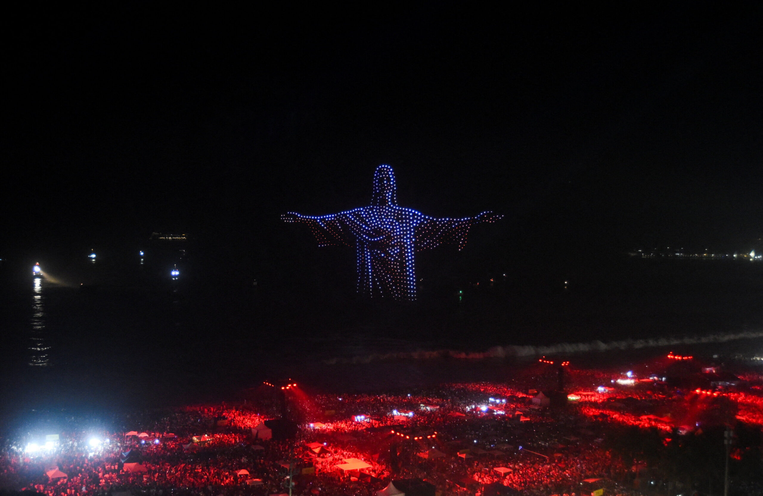 Drones make a formation depicting 'Christ the Redeemer' during New Year's celebrations at the Copacabana beach in Rio de Janeiro, Brazil, January 1, 2026. 